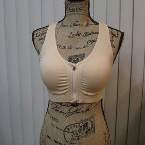 NWOT nude zip front sports bra M med